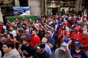 Supporters listen as Republican presidential nominee Donald Trump at a campaign rally in York, Pa. on Monday.